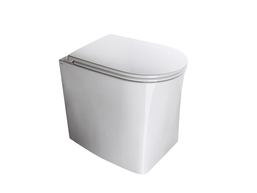 WC à poser Dp sans bride adossé au mur blanc brillant | IperCeramica