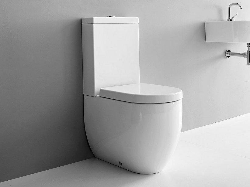 WC monobloc Flo 60x36 cm adossé au mur sortie horizontale/verticale blanc brillant | IperCeramica WC monobloc Flo 60x36 cm adossé au mur sortie horizontale/verticale blanc brillant | IperCeramica