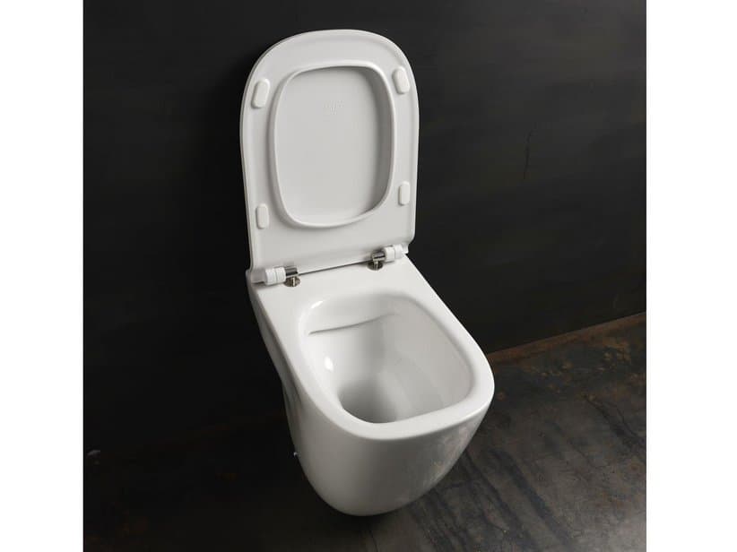 WC à poser Wild sans bride 52x34 cm adossé au mur sortie horizontale/verticale blanc brillant | IperCeramica WC à poser Wild sans bride 52x34 cm adossé au mur sortie horizontale/verticale blanc brillant | IperCeramica