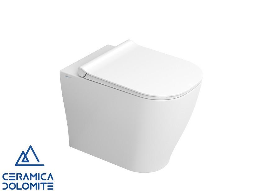 Wandbündiges Stand-WC Italia versetzt, Rimless, Weiß glänzend | IperCeramica Wandbündiges Stand-WC Italia versetzt, Rimless, Weiß glänzend | IperCeramica